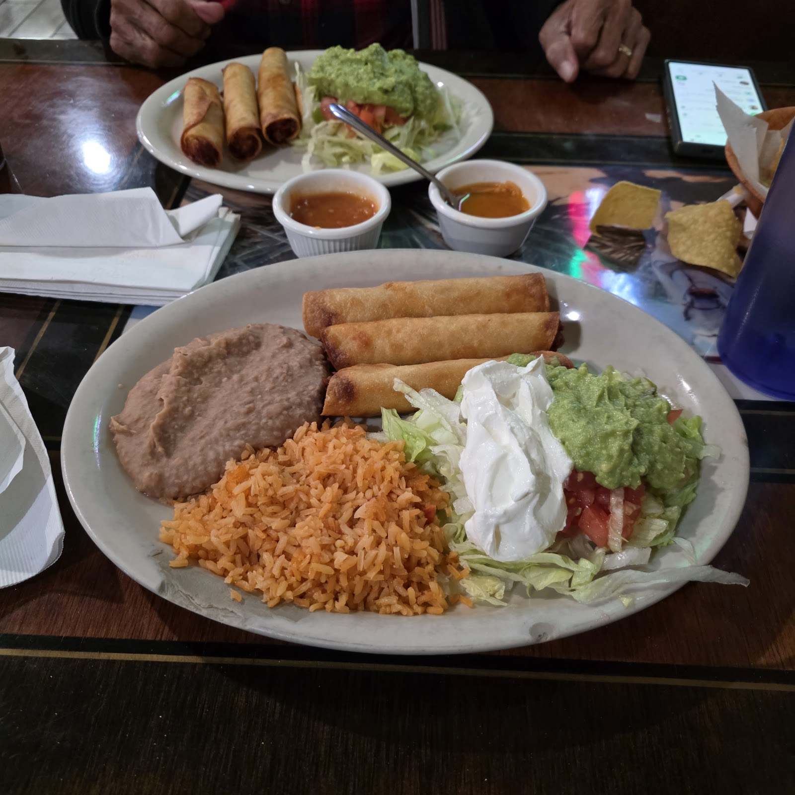 Crispy beef flautas with guacamole and sour cream