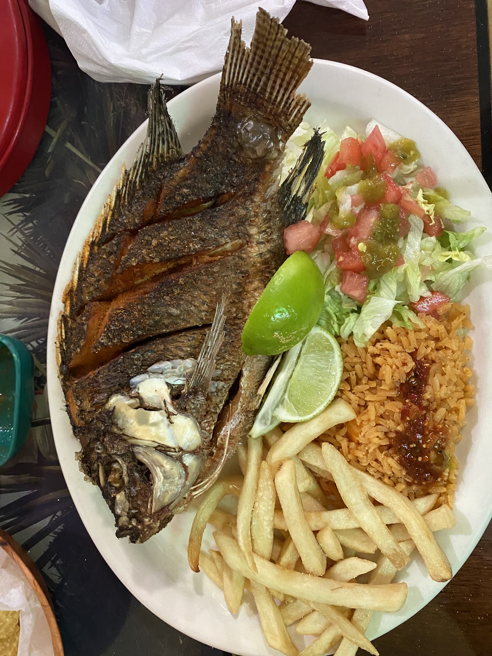 Sizzling fajitas mixtas with shrimp and steak in a stone molcajete
